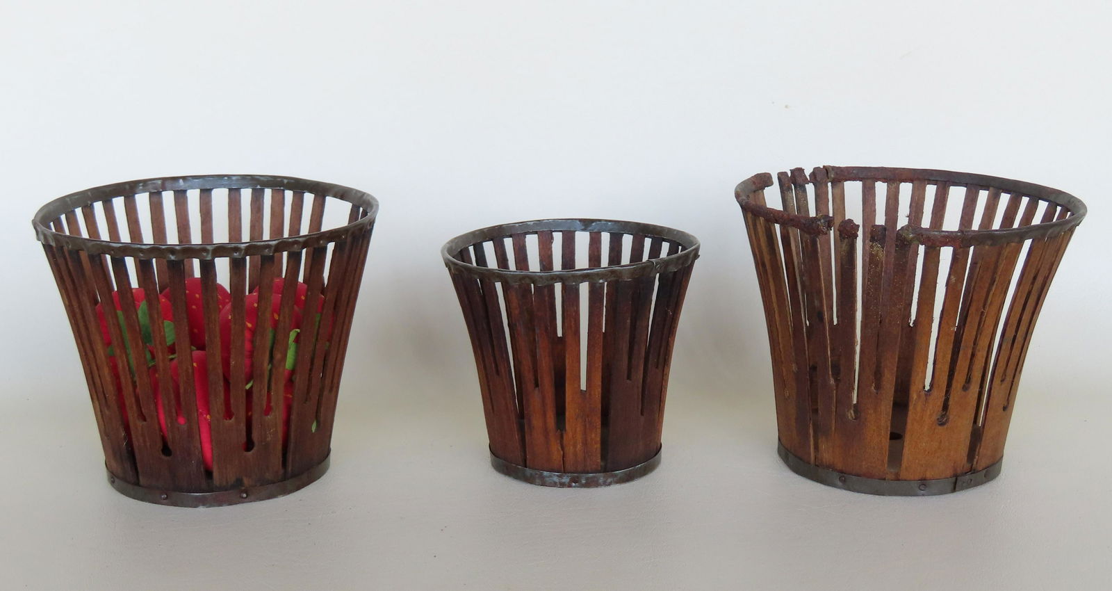 Three wooden Shaker berry baskets with tin hoops across the flared rim and around the base, combined (1 of 14)