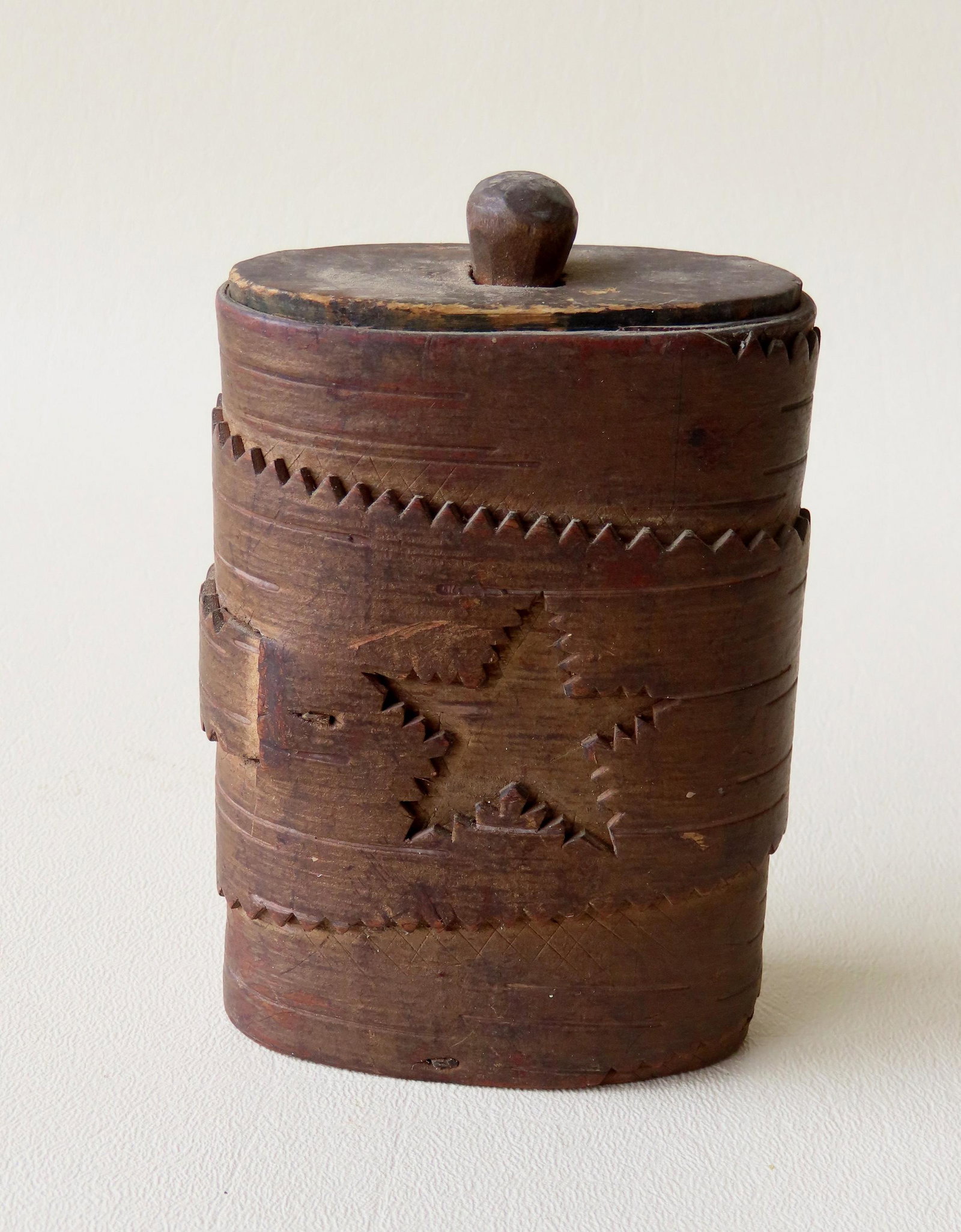 An early folkart birch bark tinder box wrapped with a carved lapped finger with an open-work cut (1 of 7)
