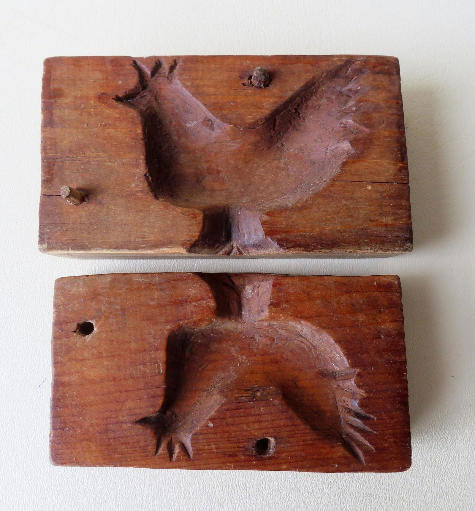 A hand carved wood maple sugar mold in 2 parts in the form of a rooster - the exterior with a carved (1 of 6)