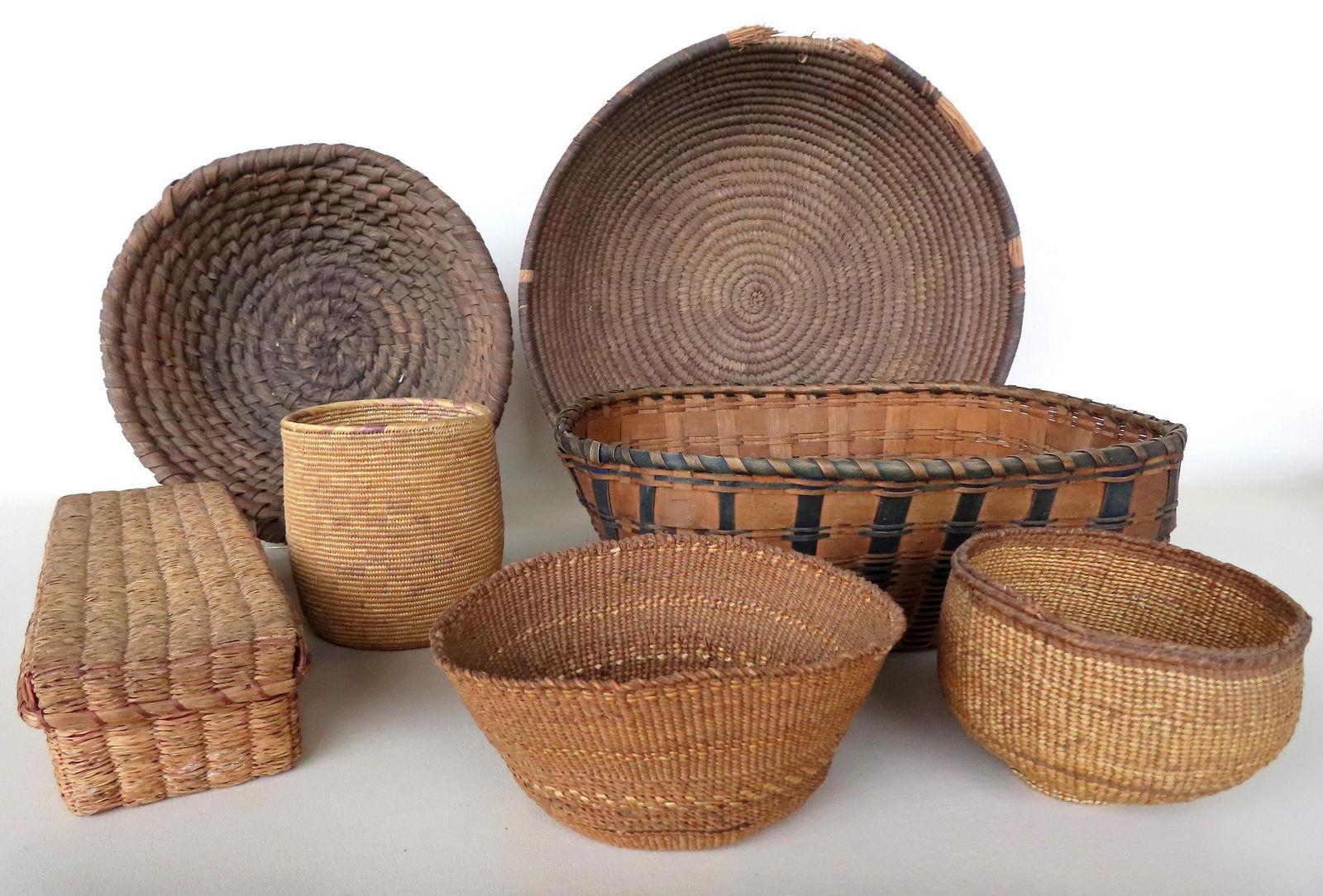 Grouping of 7 Native America baskets, various tribes including Northwest Coast. Most in good (1 of 20)