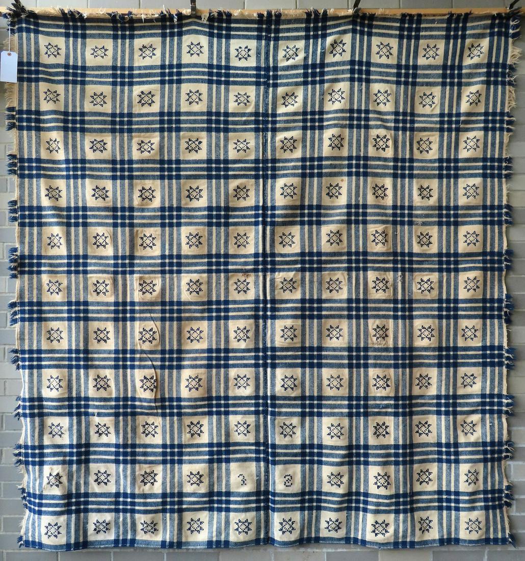 A homespun blue and white wool blanket with center seam, decorated with cross-stitched stars within (1 of 5)