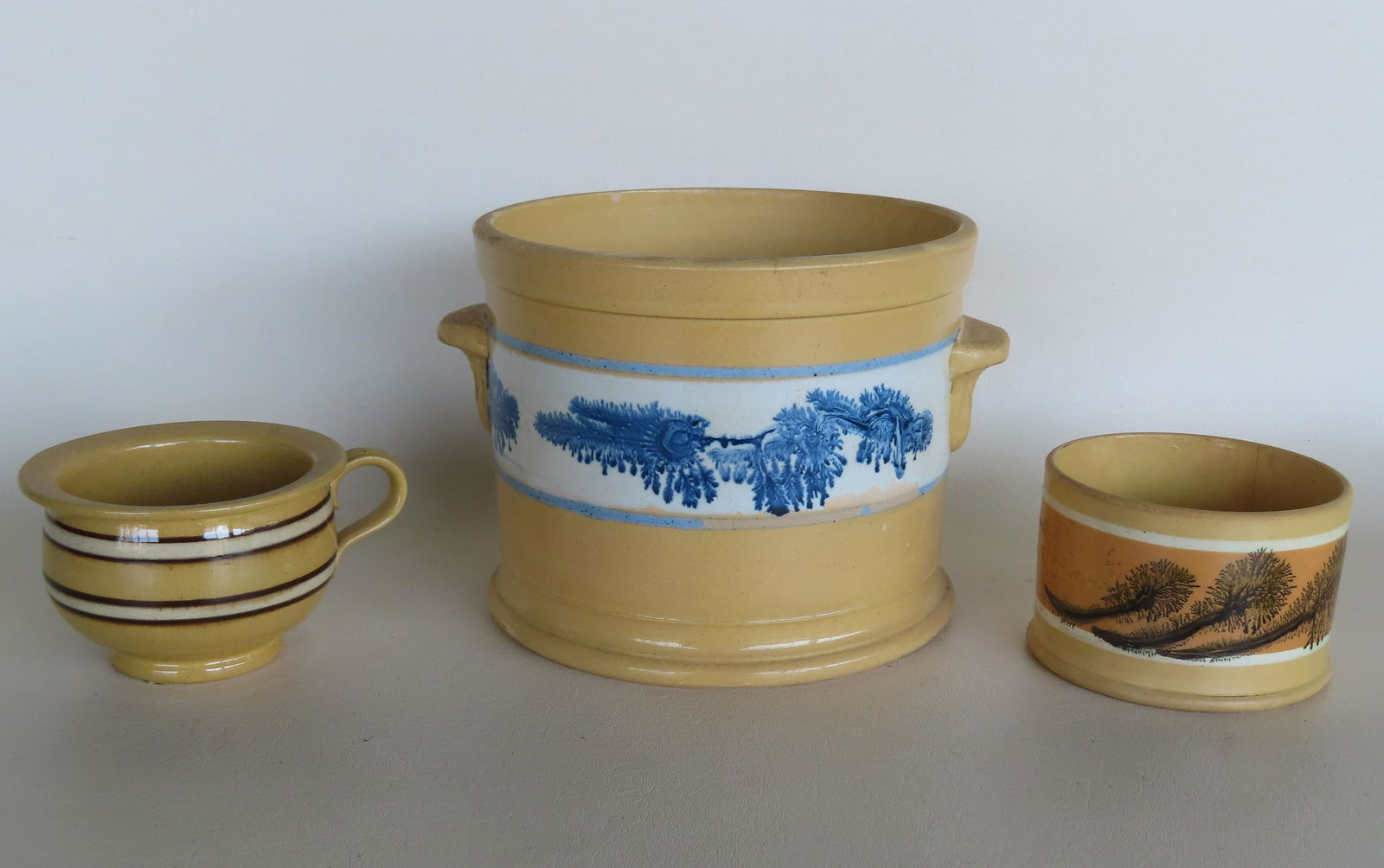 Three pieces of mochaware including: 1) Large sugar bowl with seaweed decorations and having double (1 of 15)