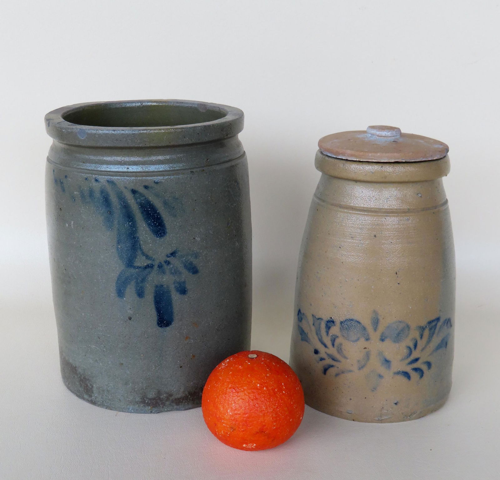 Two stoneware pantry jars. The first with blue stenciled flowers on front - replaced lid, small (1 of 10)