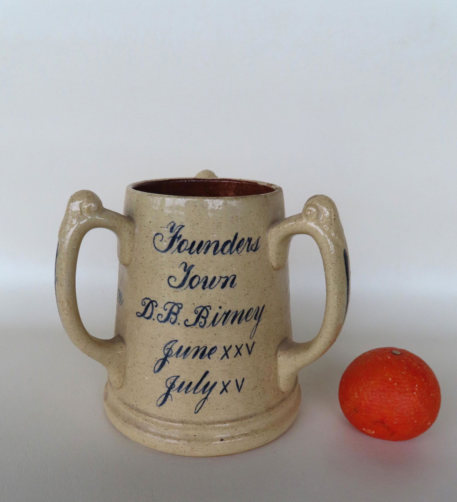 An unusual stoneware tri-handle loving cup marked in blue script in 3 areas between handles: "Fore (1 of 5)