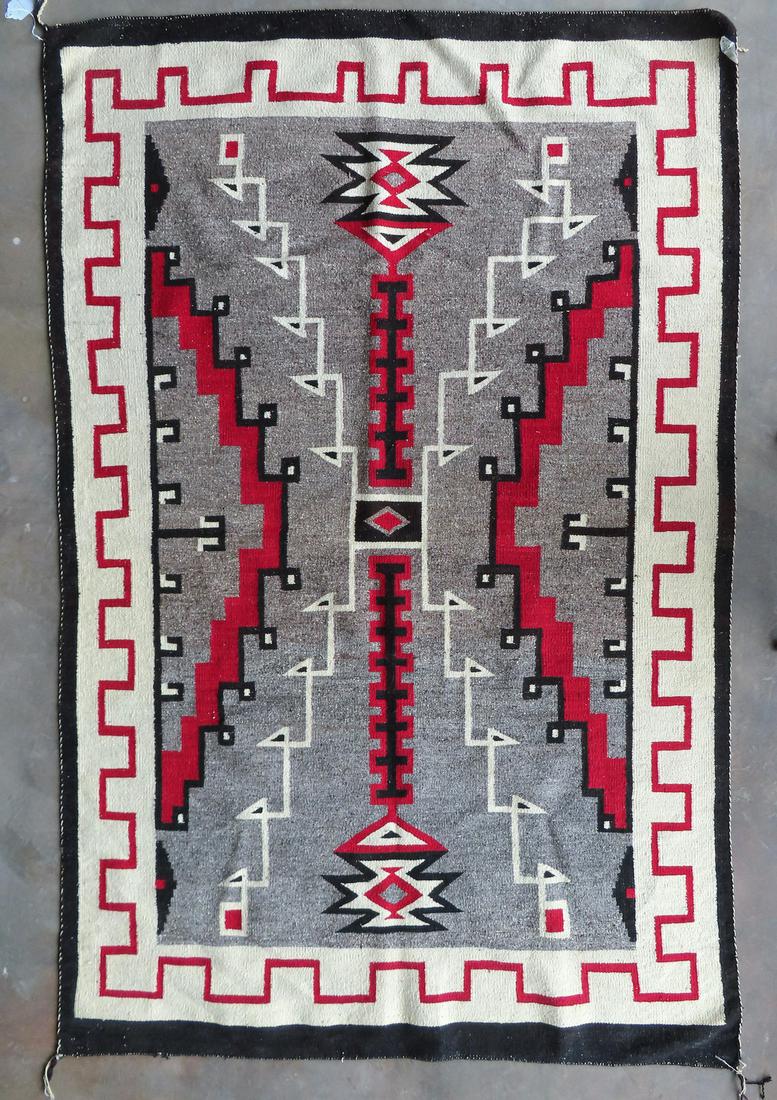 A large Navajo rug in the Storm pattern, measuring 4' 9" x 7' 1". Very clean and near excellent (1 of 5)