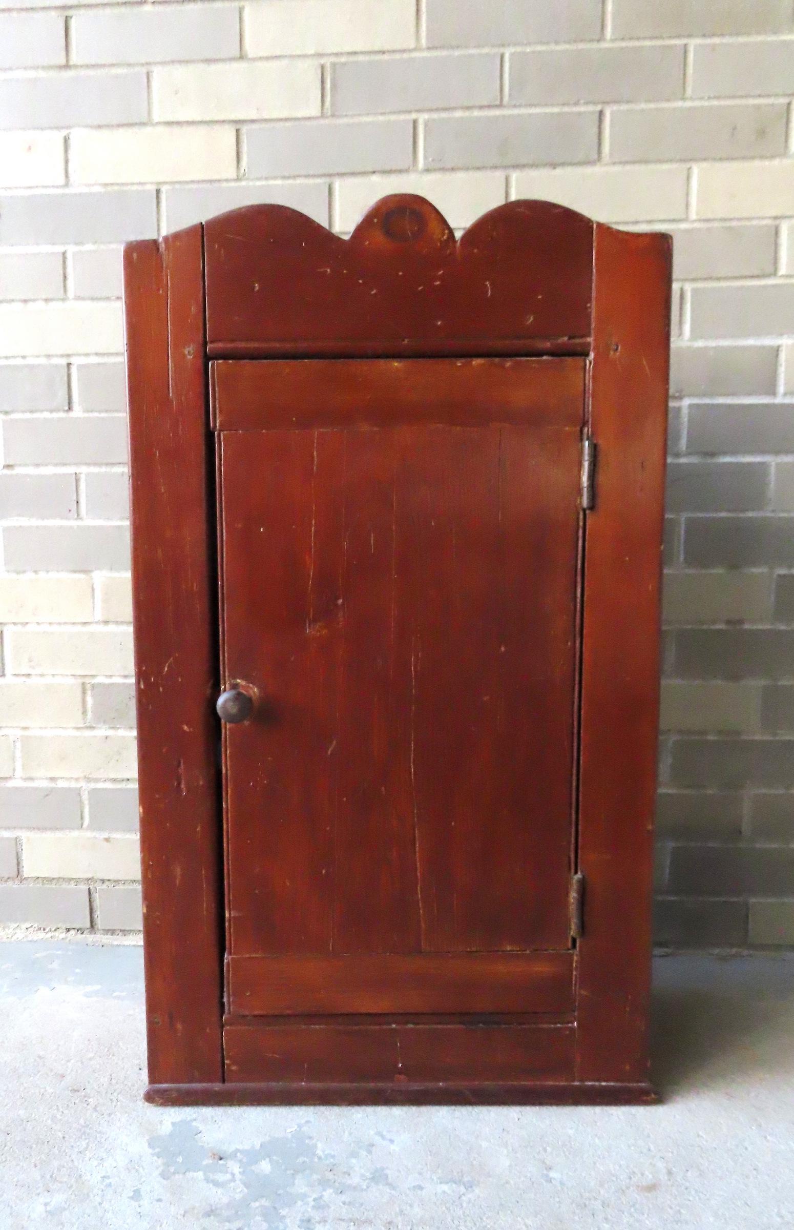 A good early pine single door wall cupboard having a shaped crest, early 19th century. Missing (1 of 8)
