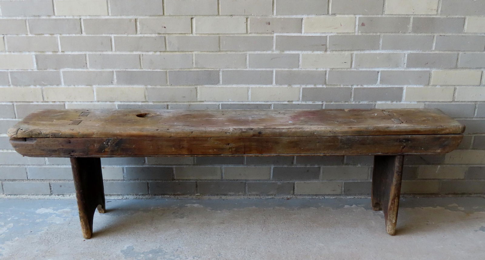 A primitive wooden bench with cutout sides and see-through mortise construction - worn top with (1 of 5)