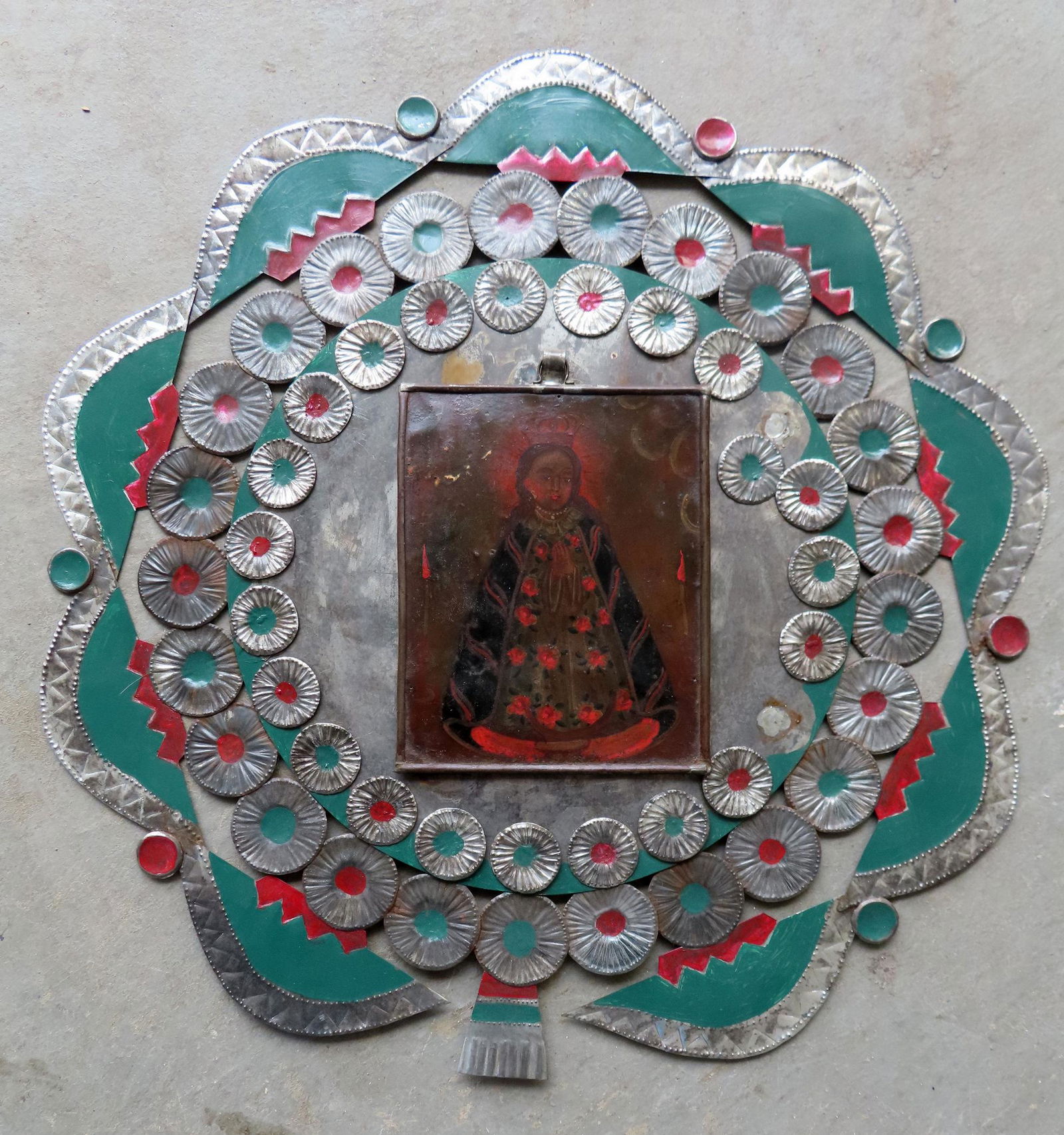 A folk art Mexican oil on tin retablo of Our Lady of San Juan de los Lagos. Darkened finish, but (1 of 6)