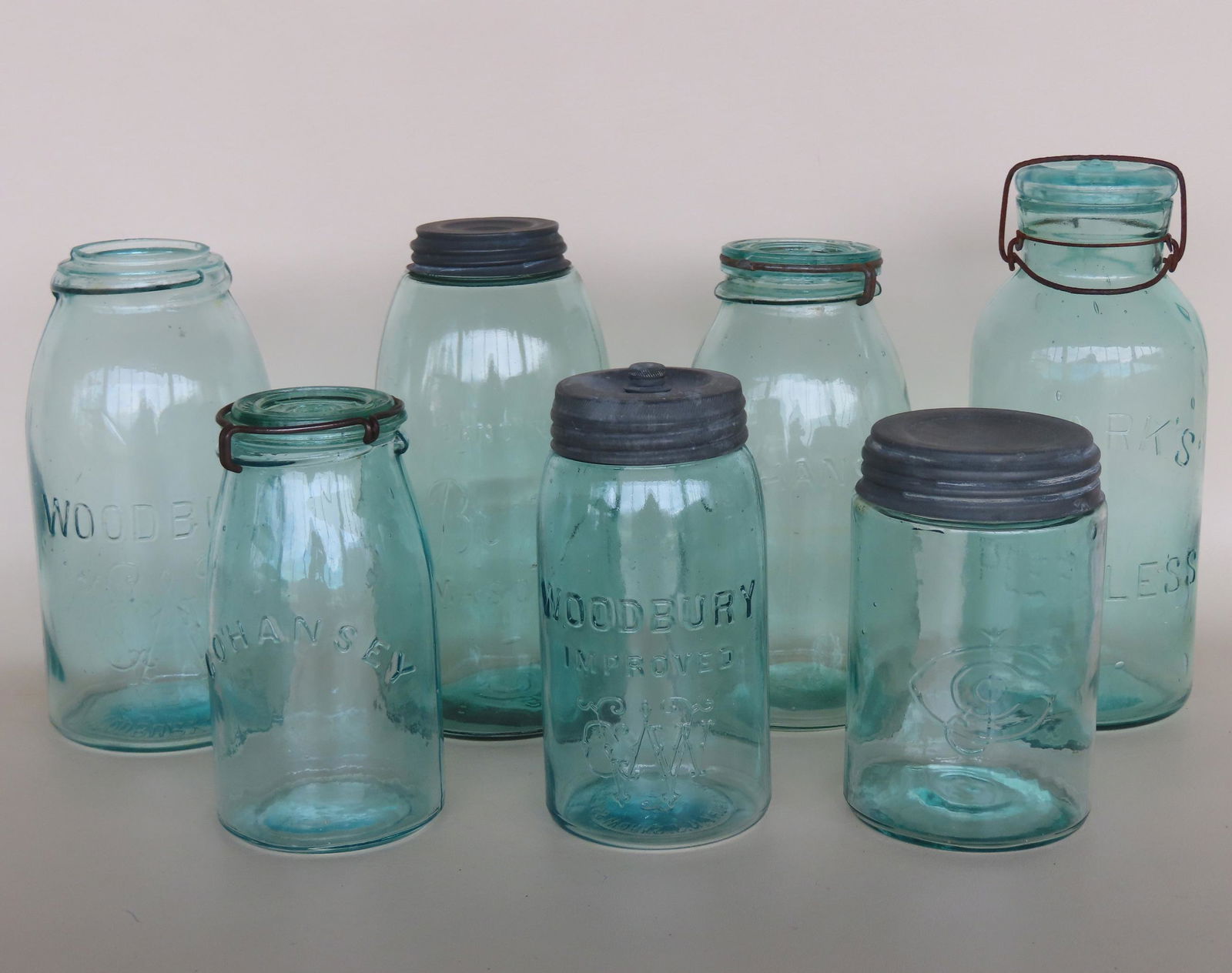 A grouping of 7 fruit jars including: "Cohansey", patent 1872 - 8 1/2"H; "Cohansey", patent 1876 - (1 of 10)