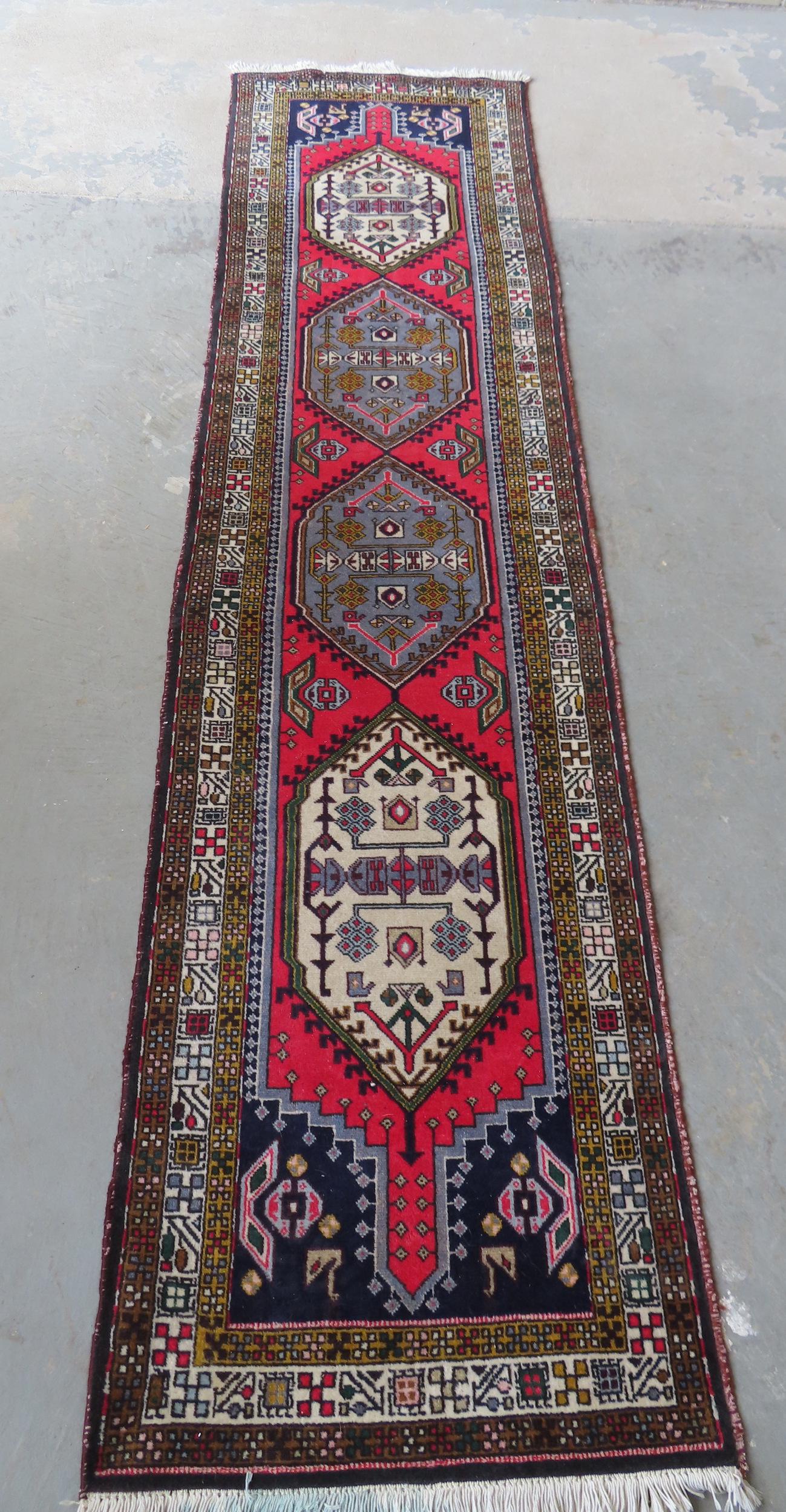 A very fine oriental runner, probably mid 20th century, very good condition. Measures 2' 3" x 9' 9". (1 of 11)