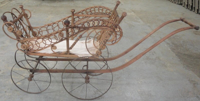 Victorian Wicker doll carriage.