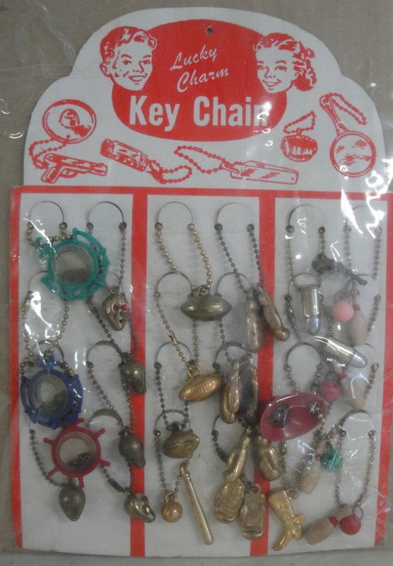 Country store display card with contents for Lucky: Country store display card with contents for Lucky Charm Key Chain, circa 1950