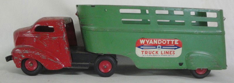 Signed Wyandotte Truck Lines pressed steel truck a: Signed Wyandotte Truck Lines pressed steel truck and trailer in original paint - 24.5" l