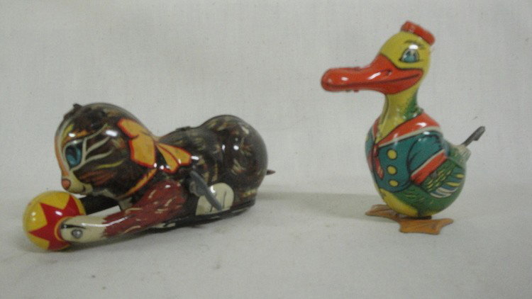 Five windup toys inc. newspaper bear, cat with bal: Five windup toys inc. newspaper bear, cat with ball, horse, duck, snail plus lead Arabian soldier.