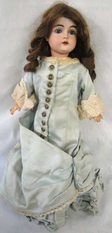 German doll - signed illegibly - marked Germany 16: German doll - signed illegibly - marked Germany 167 - crack to back of head - sleepy blue eyes and open mouth with teeth - gesso over wood body - plaster missing from legs and some losses on arms - di