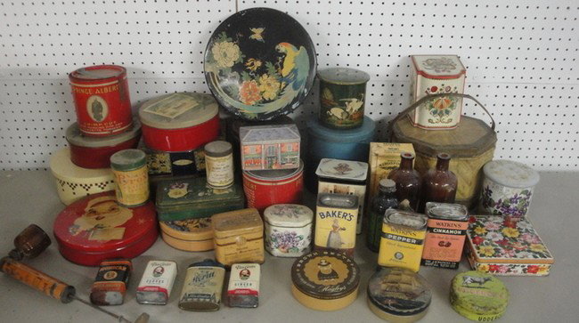 Large lot of old advertising tins and bottles.: Large lot of old advertising tins and bottles.