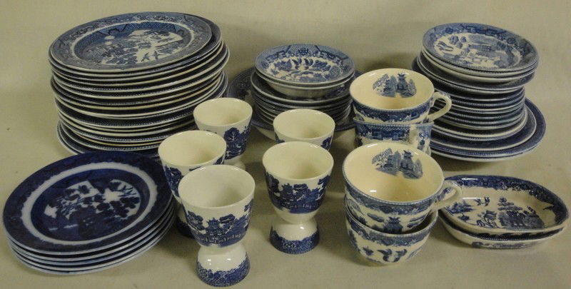 Large collection of blue willow china inc. sugar b: Large collection of blue willow china inc. sugar bowls, pitchers, plates, platters, covered dish, egg cups, etc.