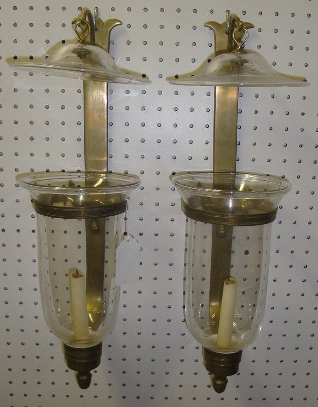 Matched pair of brass wall sconces with glass dome: Matched pair of brass wall sconces with glass domes and bell