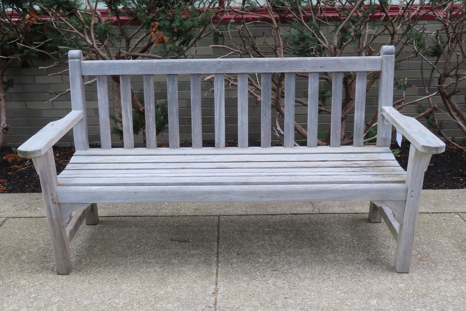 a Teakwood garden bench, mortise and tenon construction, late 20th to early 21st century. Measures (1 of 5)