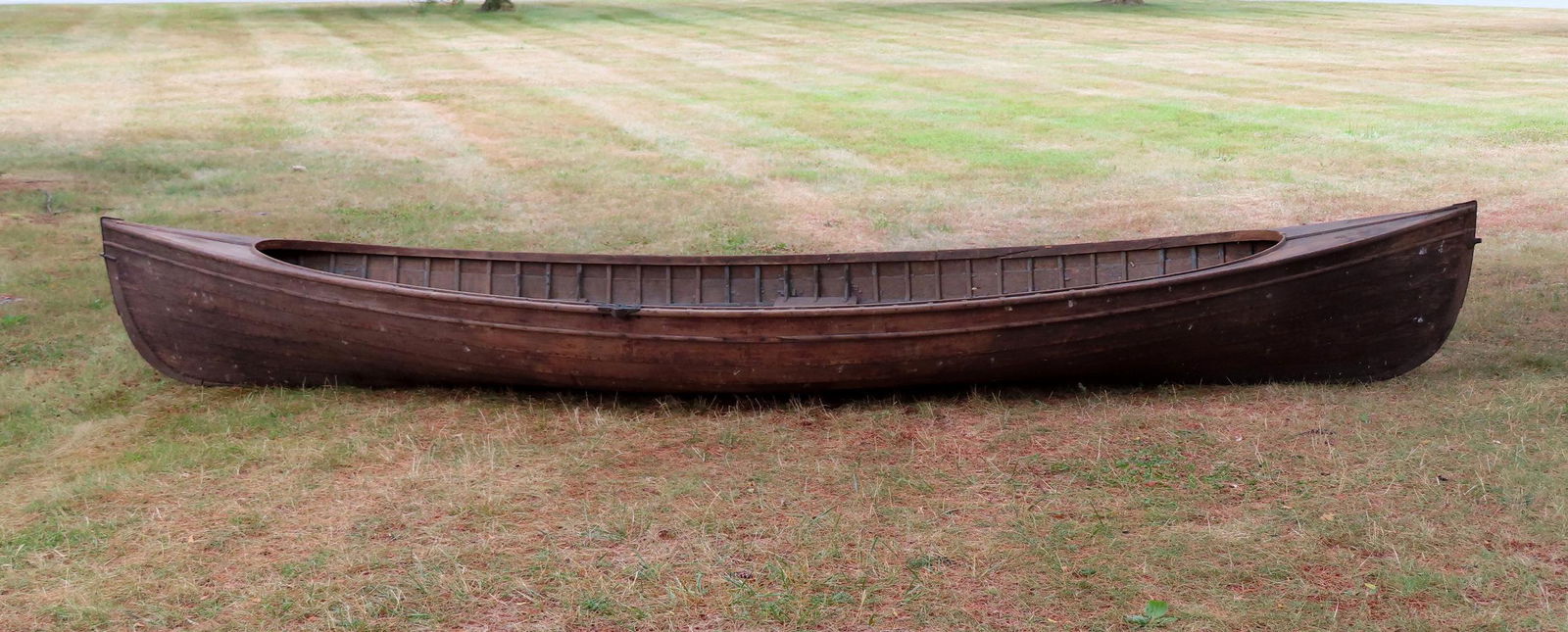 An original wooden St. Lawrence River skiff guide boat,  circa 1900 - as found condition which is (1 of 20)