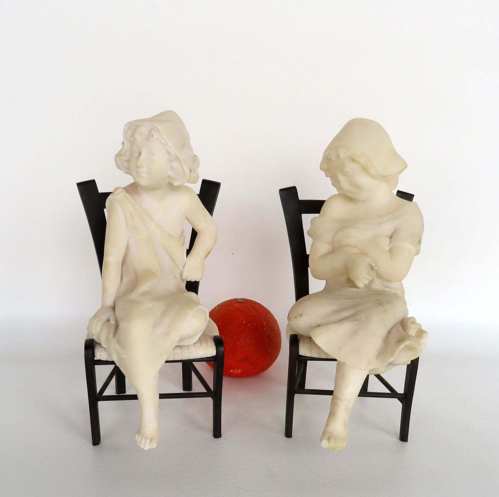 A pair of marble sculptures of a young boy and young girl seated on bronze chairs - not signed. Each (1 of 7)