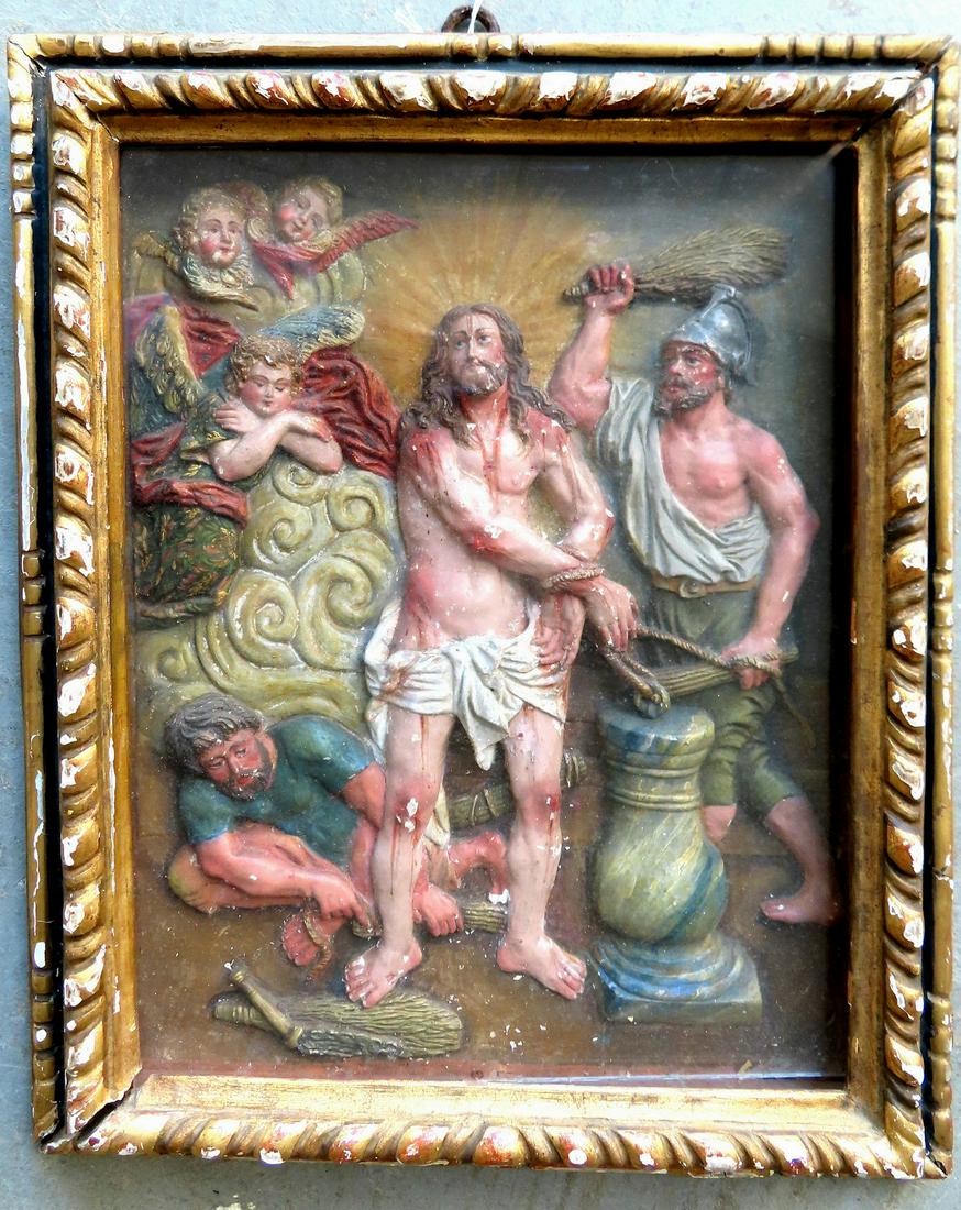 An early hand painted and carved composition sculpture depicting the flogging of Christ with angels (1 of 5)