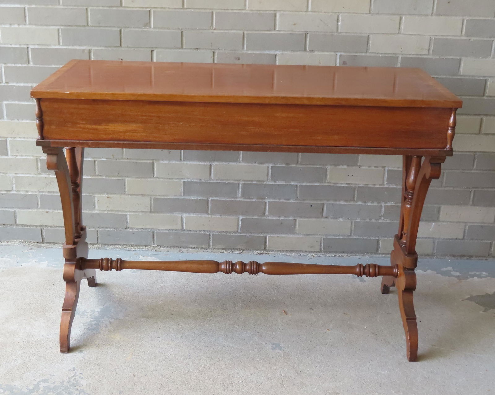 A regency style mahogany work table having banded inlay around perimeter of top, arched feet and (1 of 10)
