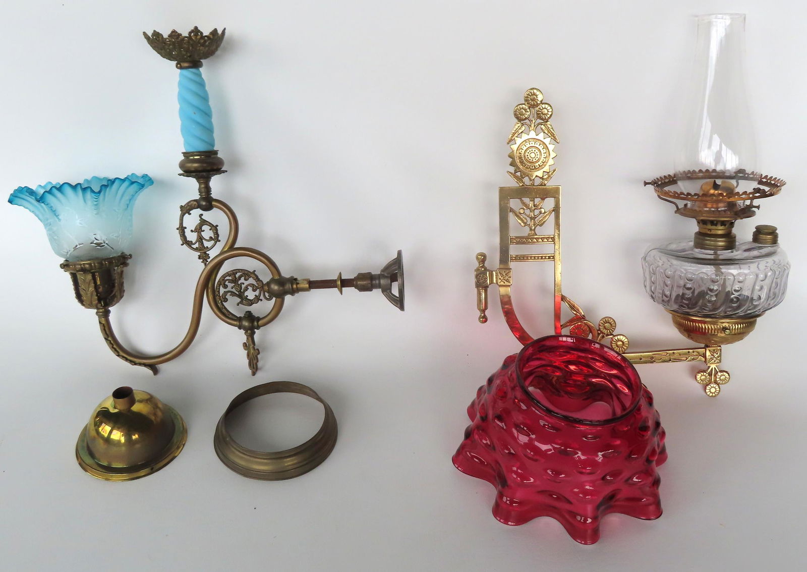 Two  Victorian wall mounted lighting devices including: 1) Brass bracket oil lamp with ornate holder (1 of 10)