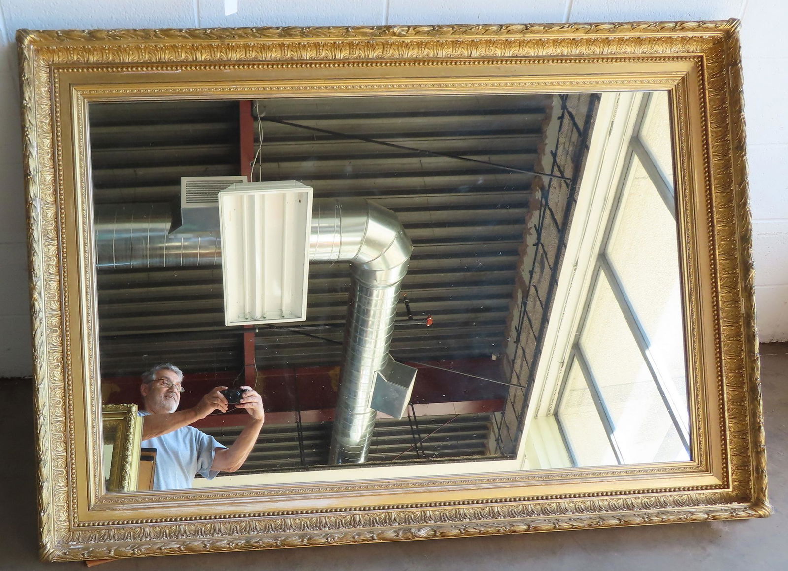 A very large gilt gesso wall mirror, probably 19th century, very good condition with minor use wear. (1 of 9)