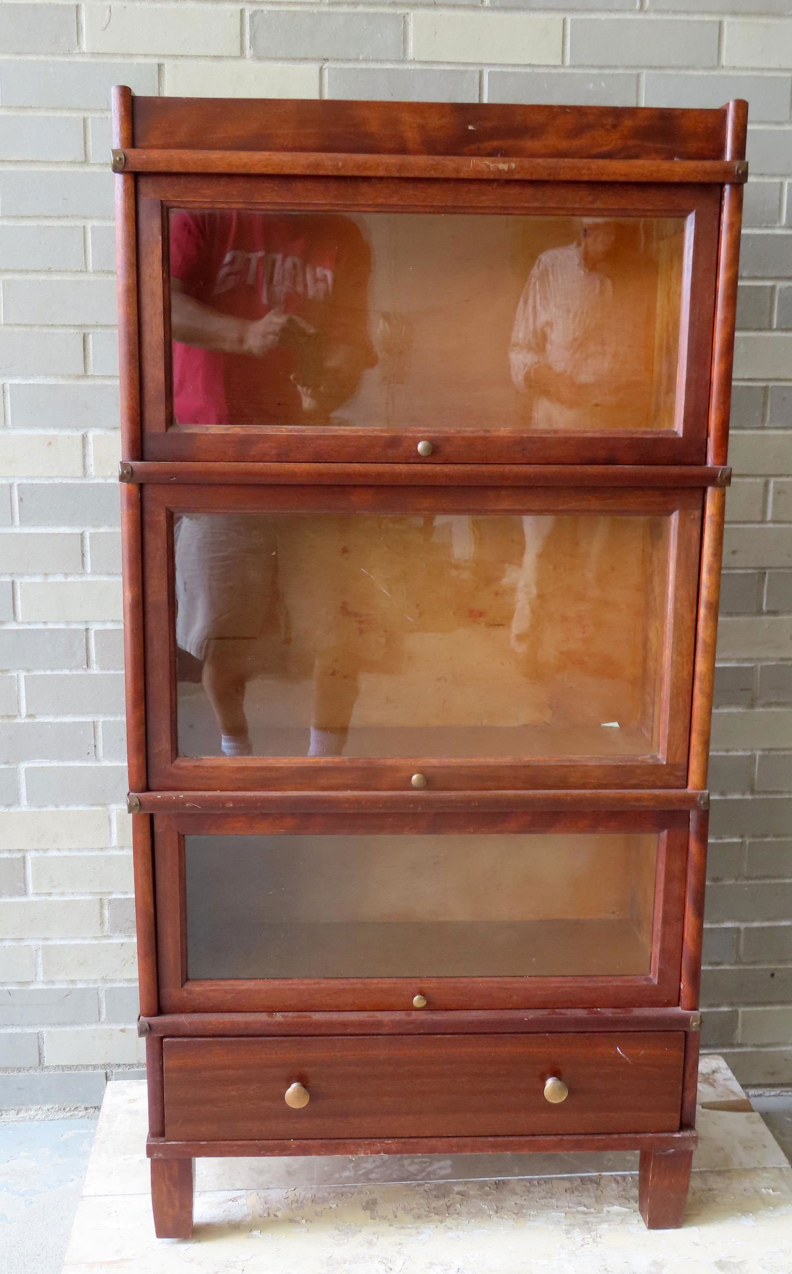 A refinished 3 section stacking bookcase with lower drawer. Birch stained a mahogany color, early (1 of 4)