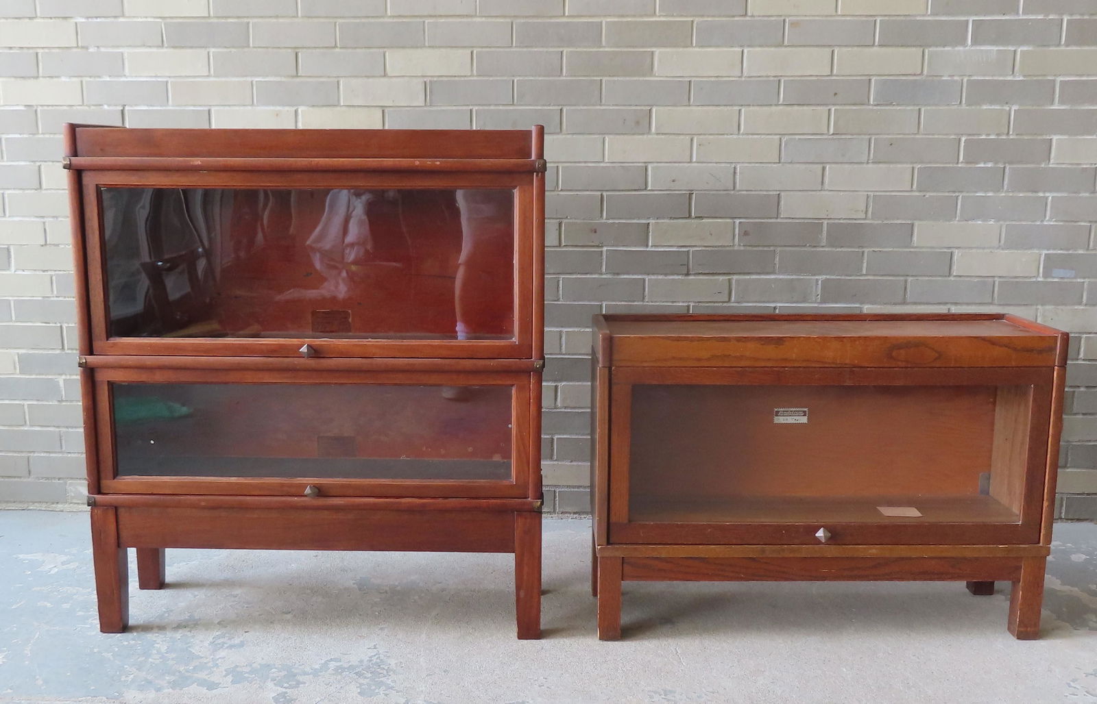 A Globe Woerneke 2 section stacking oak bookcase - the top section with paper label marked Pattern (1 of 3)