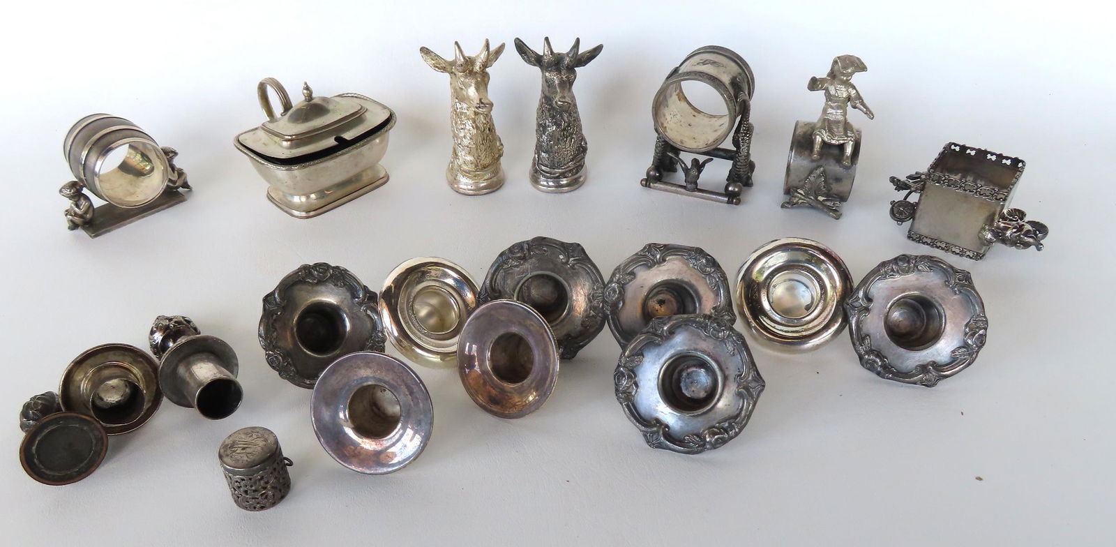 Grouping of decorative silver objects including: 4 figural silver plate napkin holders -one figure (1 of 10)