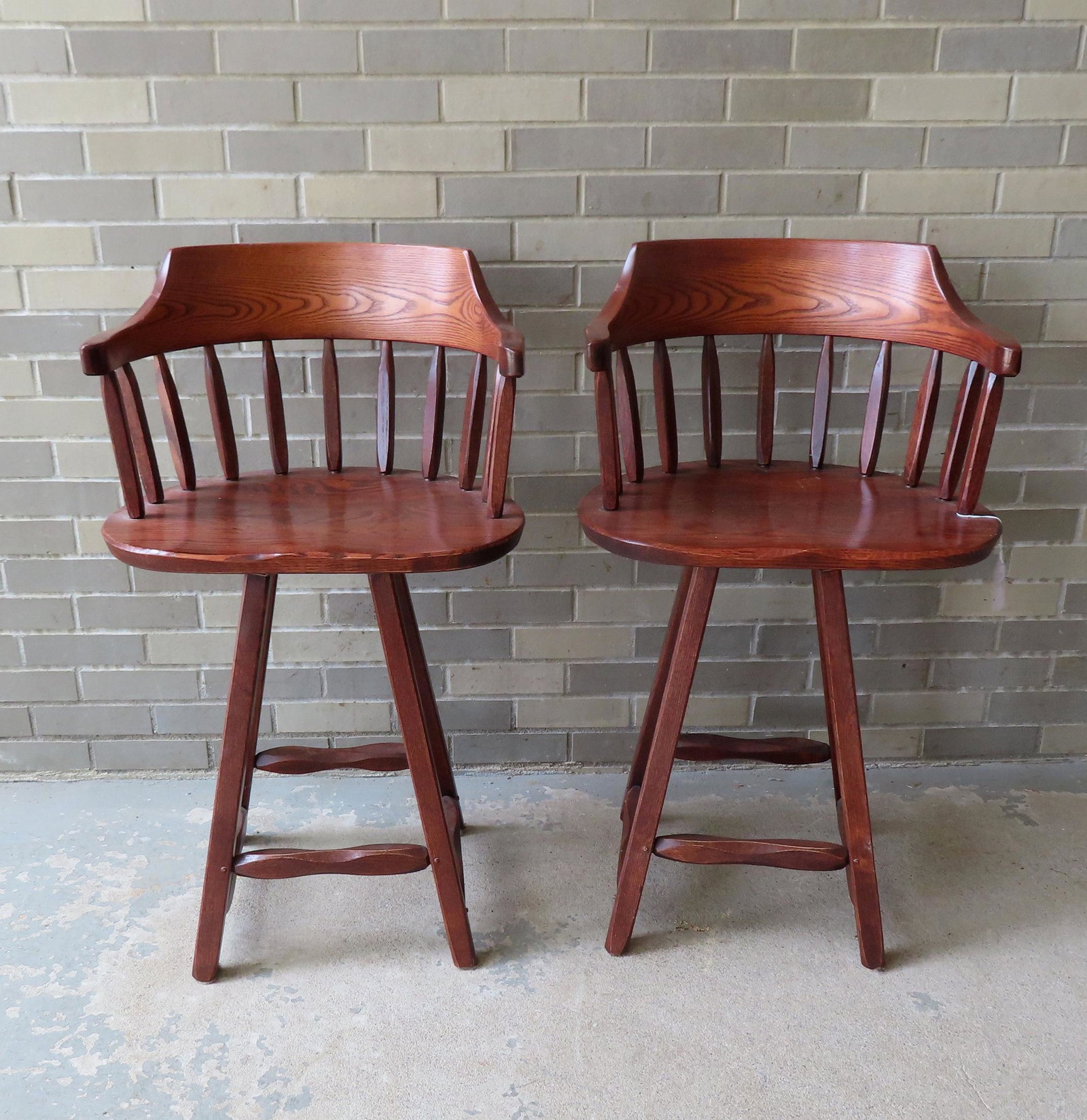 Two "Hunt Country" swivel bar stools mid to late 20th century - both very good condition. Measures: Two "Hunt Country" swivel bar stools mid to late 20th century - both very good condition. Measures 21"W x 19"D x 37"H.