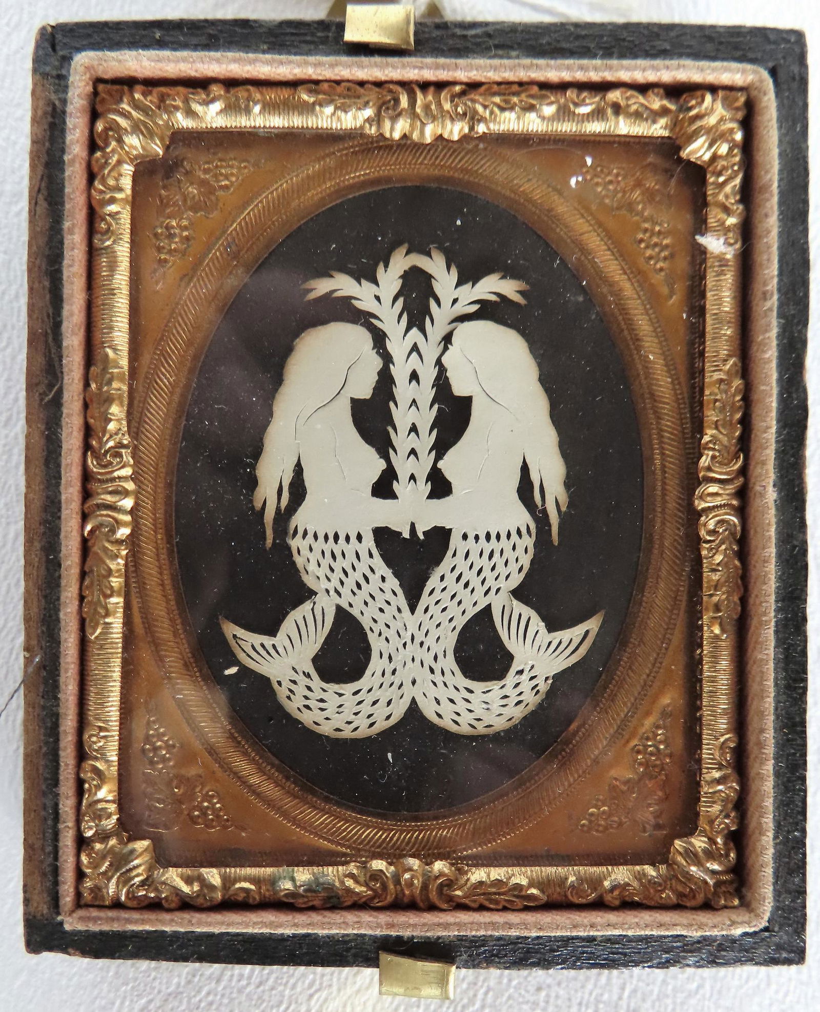 A miniature Scherenschnitt depicting two mermaids holding ocean grasses, very fine details, probably (1 of 3)