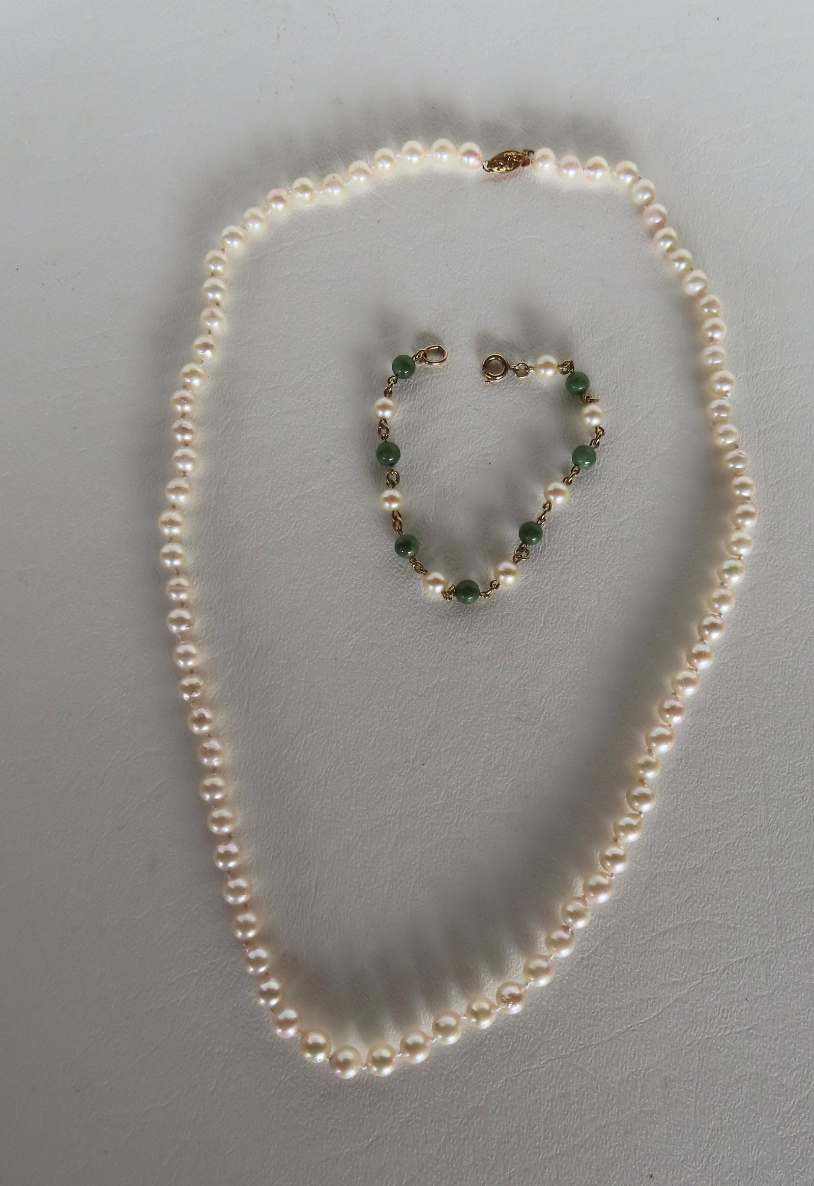 Strand cultured pearls w/ 14K gold clasp; gold-filled jade & cultured pearl bracelet. Very good (1 of 2)