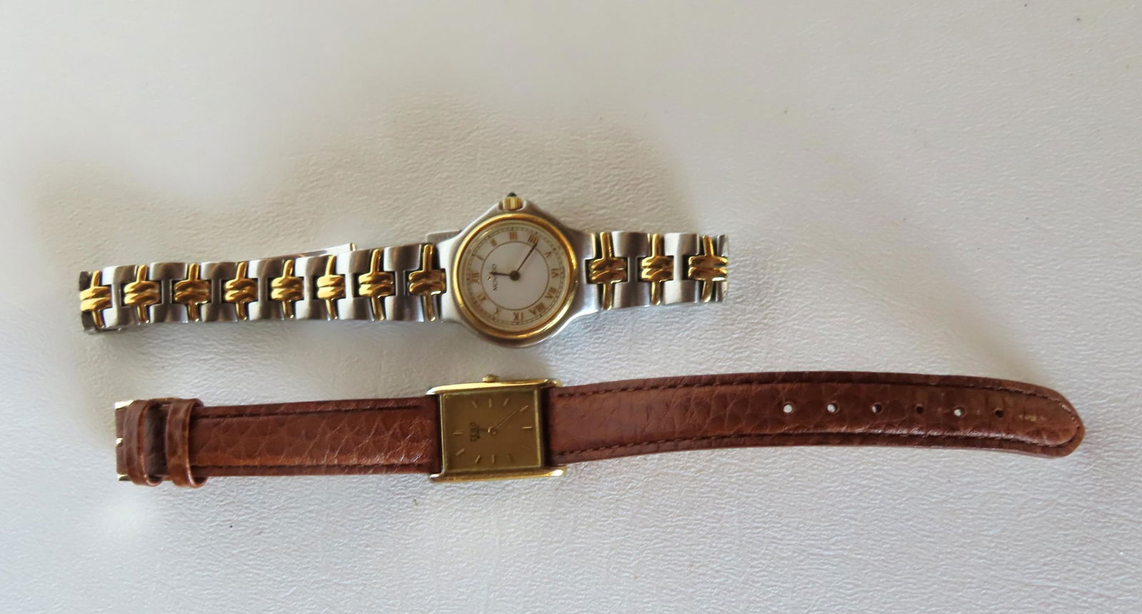 Two lady's quartz wrist watches including Movado & Seiko. Batteries need replacement, else very good: Two lady's quartz wrist watches including Movado & Seiko. Batteries need replacement, else very good condition. Provenance: From the estate of Dr. Joan Roessler, New Paltz NY.