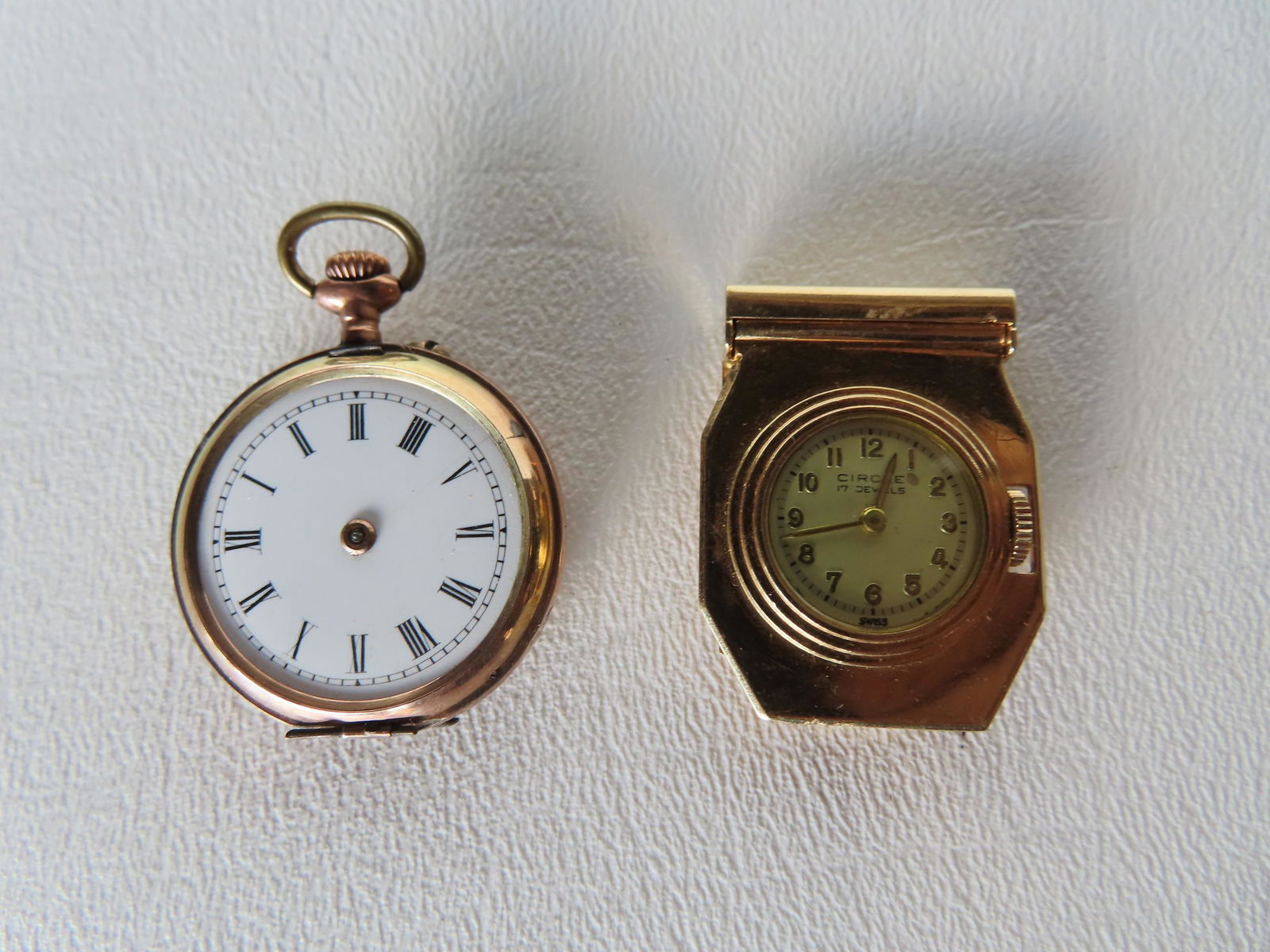 Two lady's gold watches including: The first, marked 14k on reverse and "Circle 17 Jewels / Swiss" (1 of 9)