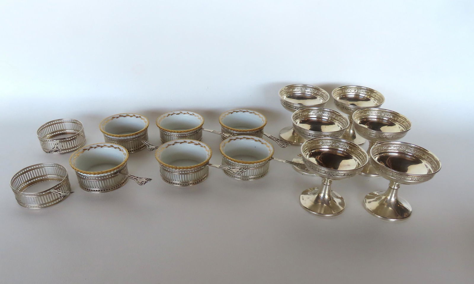 Grouping of 14 sterling silver sherbet cup holders and 6 matching white porcelain inserts (the (1 of 5)