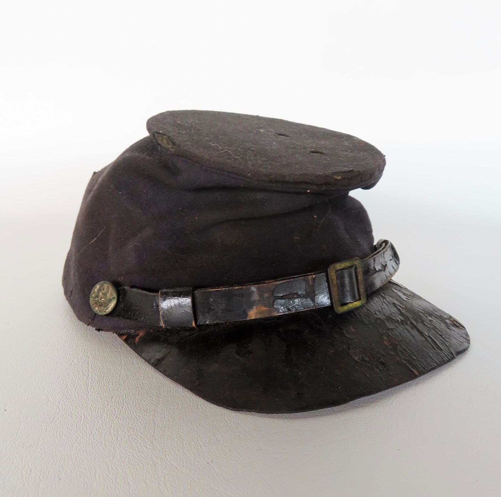 Civil War union kepi. Some moth damage, and the button holding the front band in place across the (1 of 8)