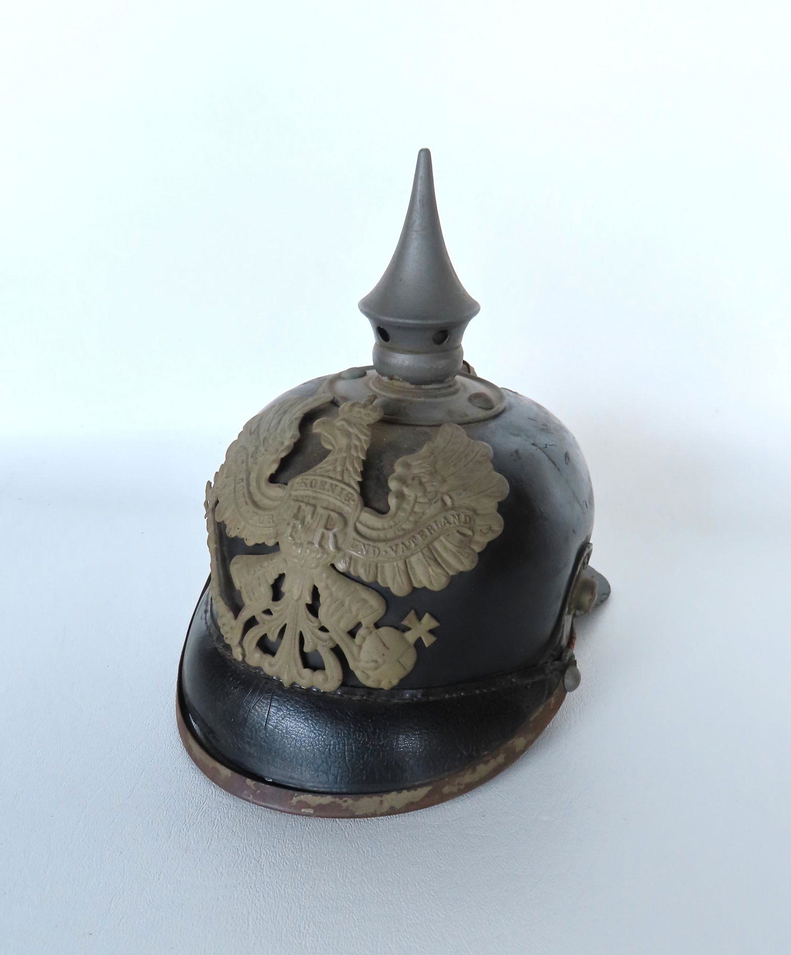 German WWI spiked leather helmet with original lining. Dent in leather on one side, slight crazing, (1 of 6)