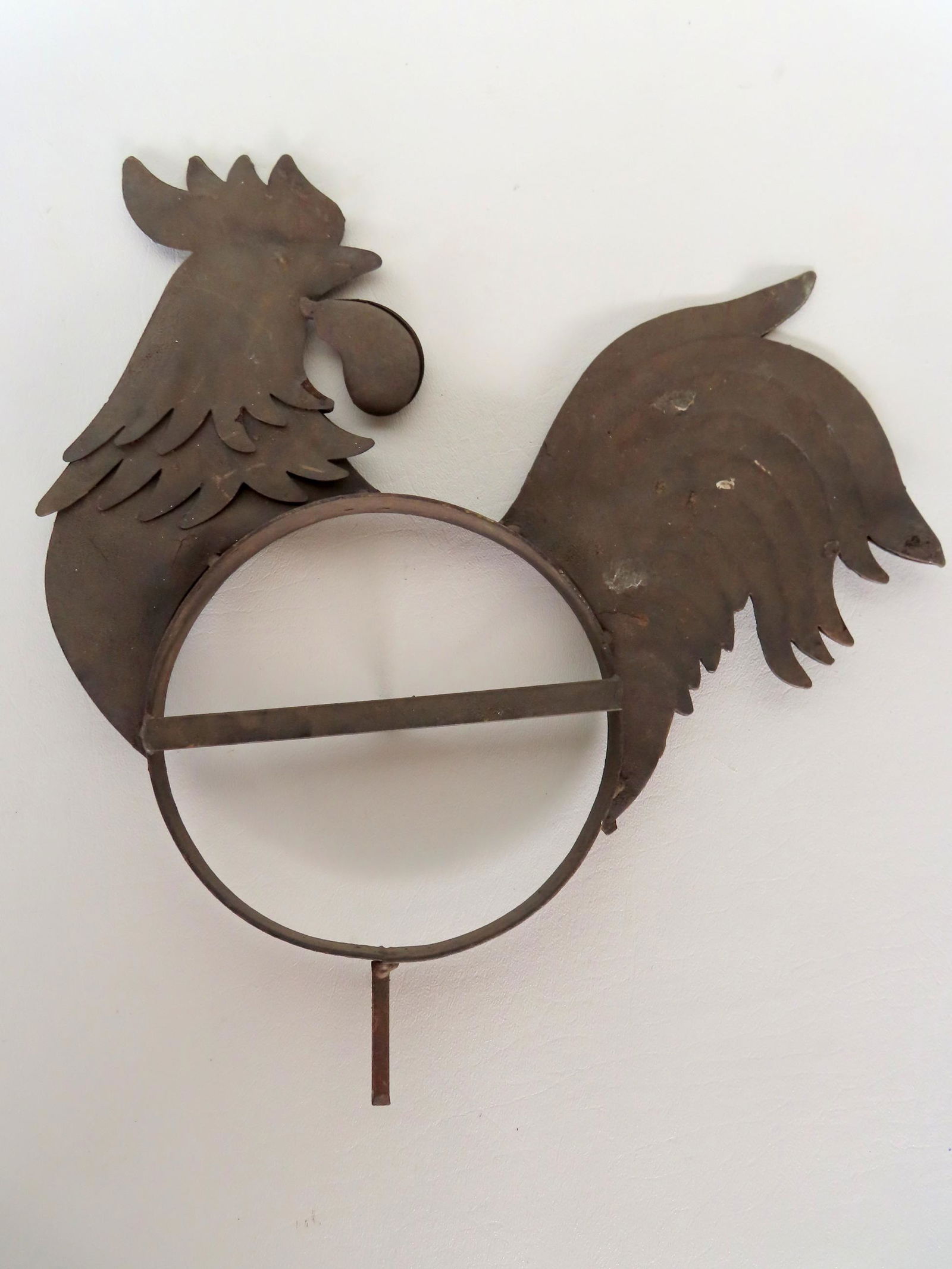 An unusual folkart tin rooster with good body details, but unsure of use. It has a soldered iron (1 of 4)