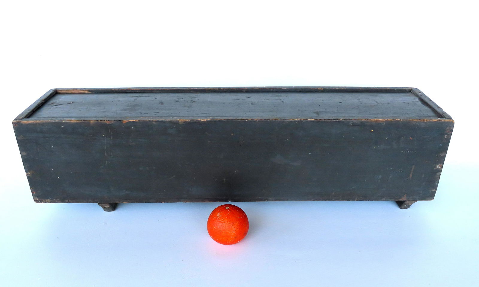 A long primitive 19th century slide lid footed box in original green paint - note the lid with (1 of 7)