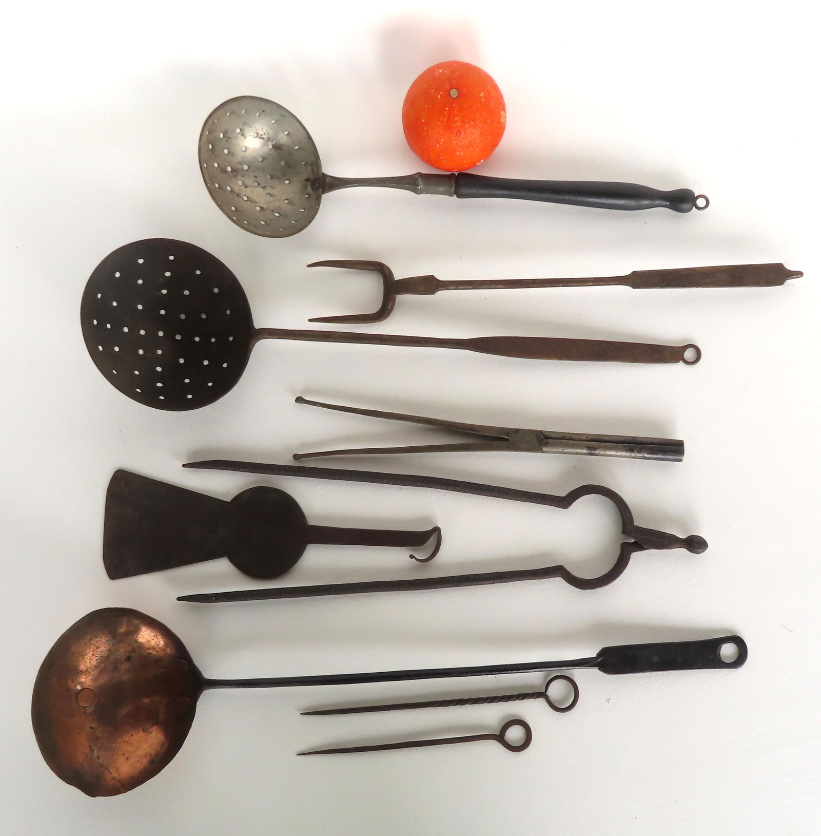 Grouping of 9 early kitchen implements, 19th century. (1 of 5)