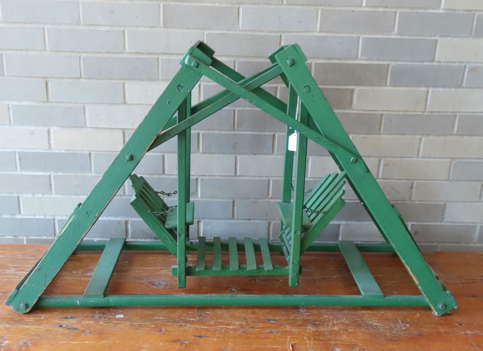 A working porch glider model or salesman sample in original green paint, mid 20th century or (1 of 4)