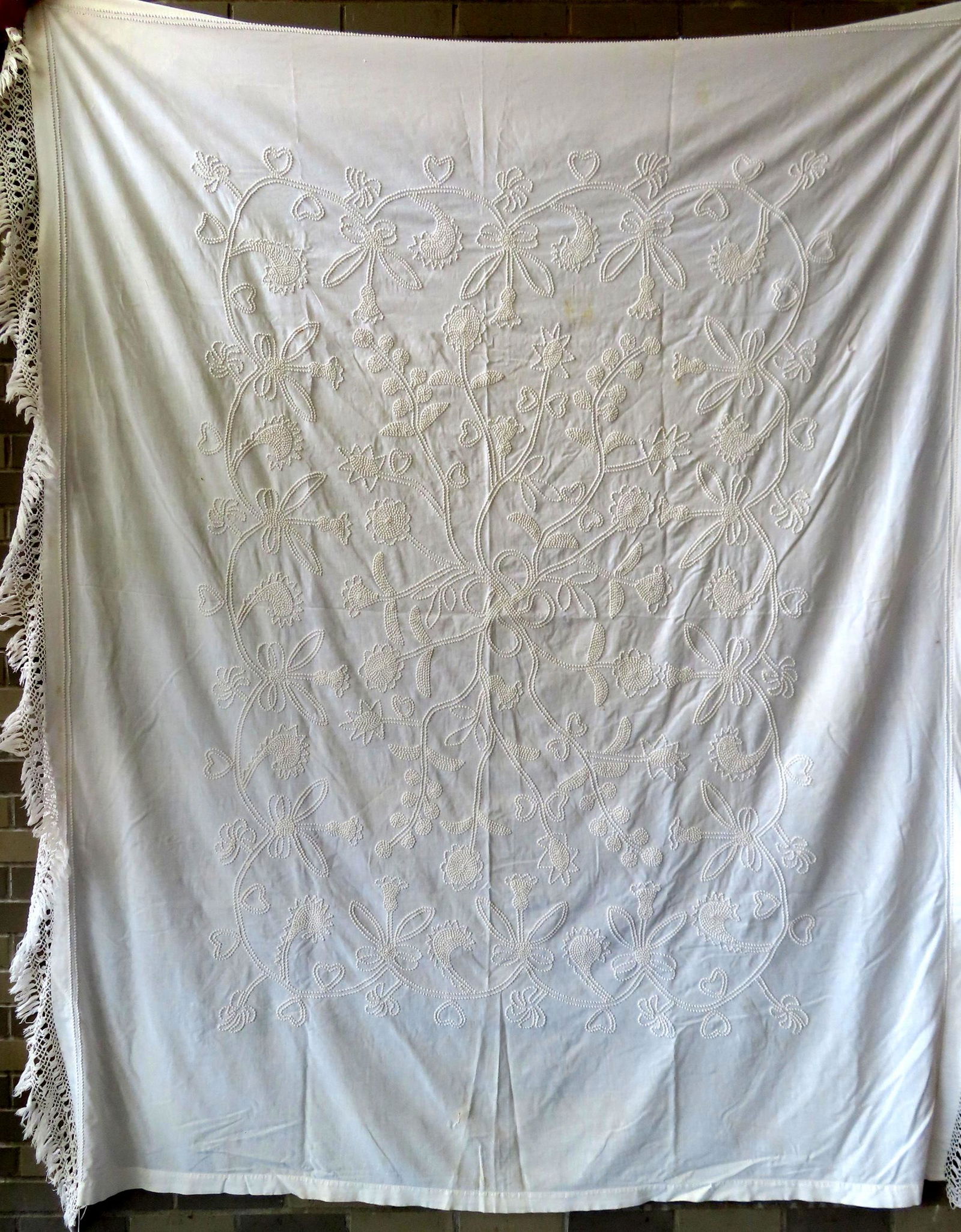 Two white textiles. The first a candlewick spread decorated with flowers - 2 small tears otherwise (1 of 13)