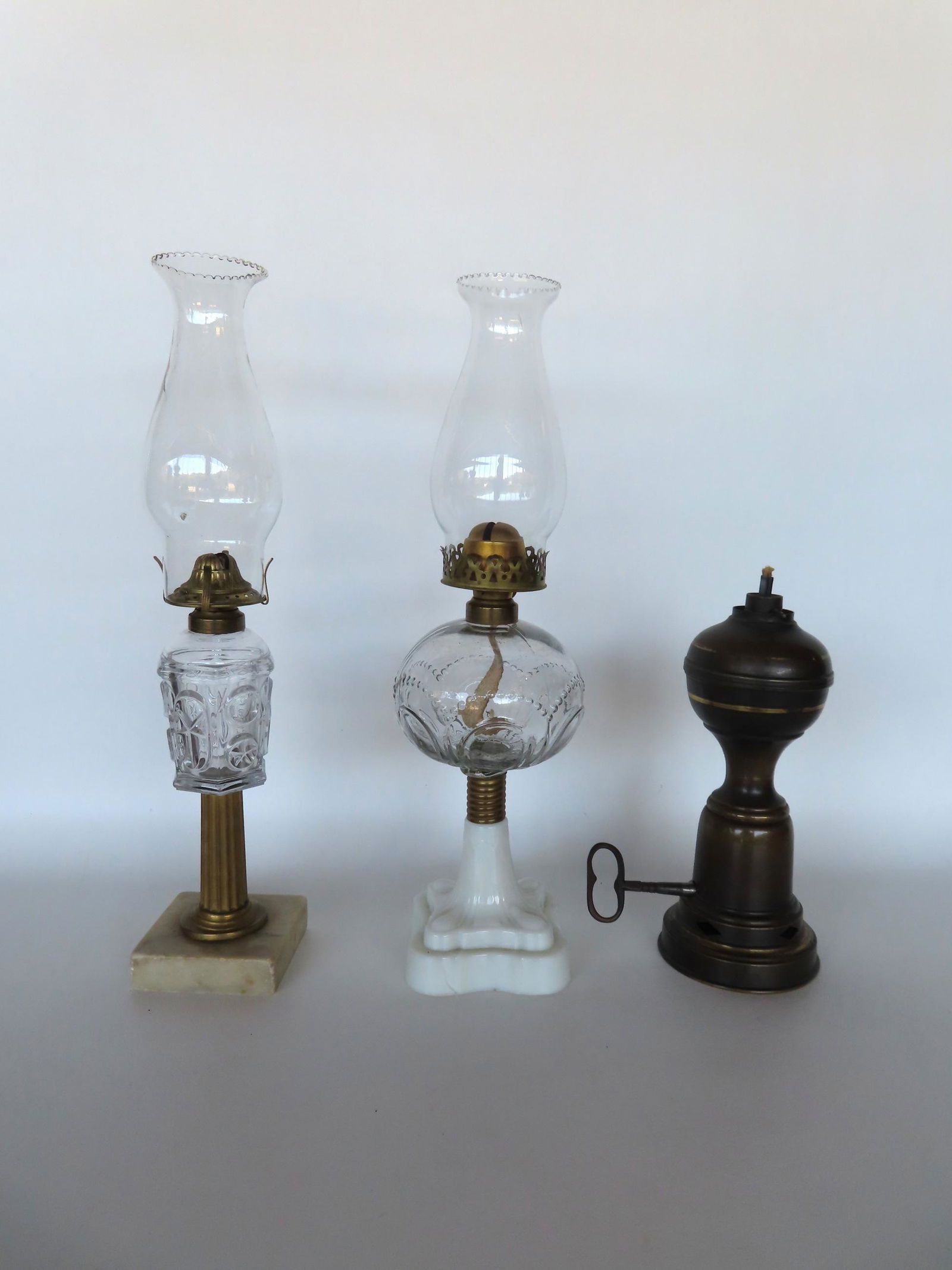 Three 19th century oil lamps. 1) Two mold blown font mounted on milk glass base - 12"H to top of (1 of 6)