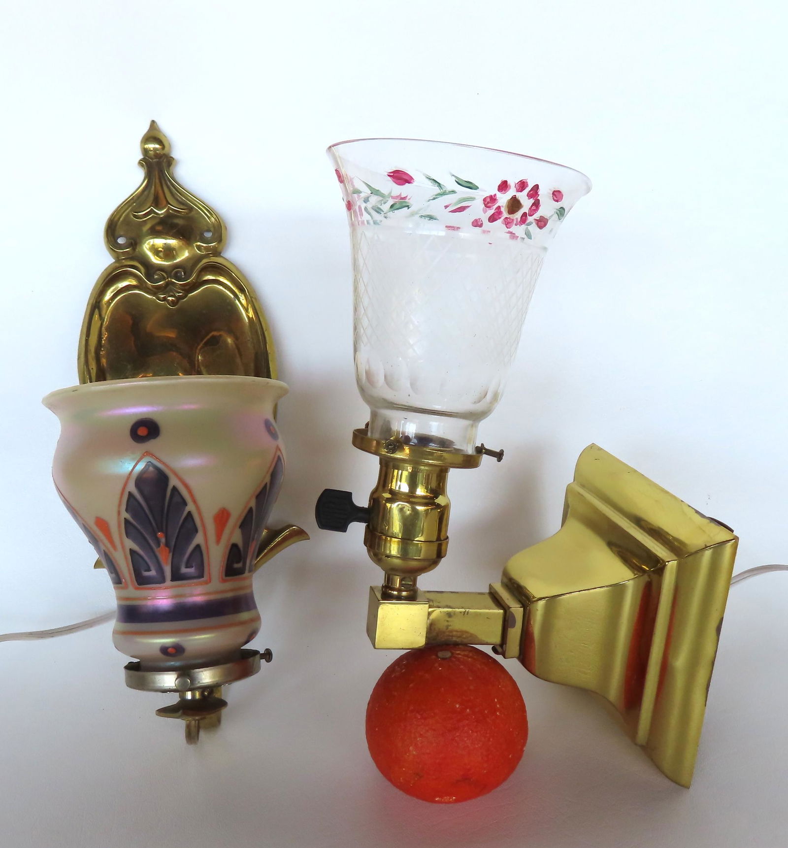 Two electrified brass lamp brackets, one with an unsigned Arts & Crafts glass shade and the other (1 of 9)