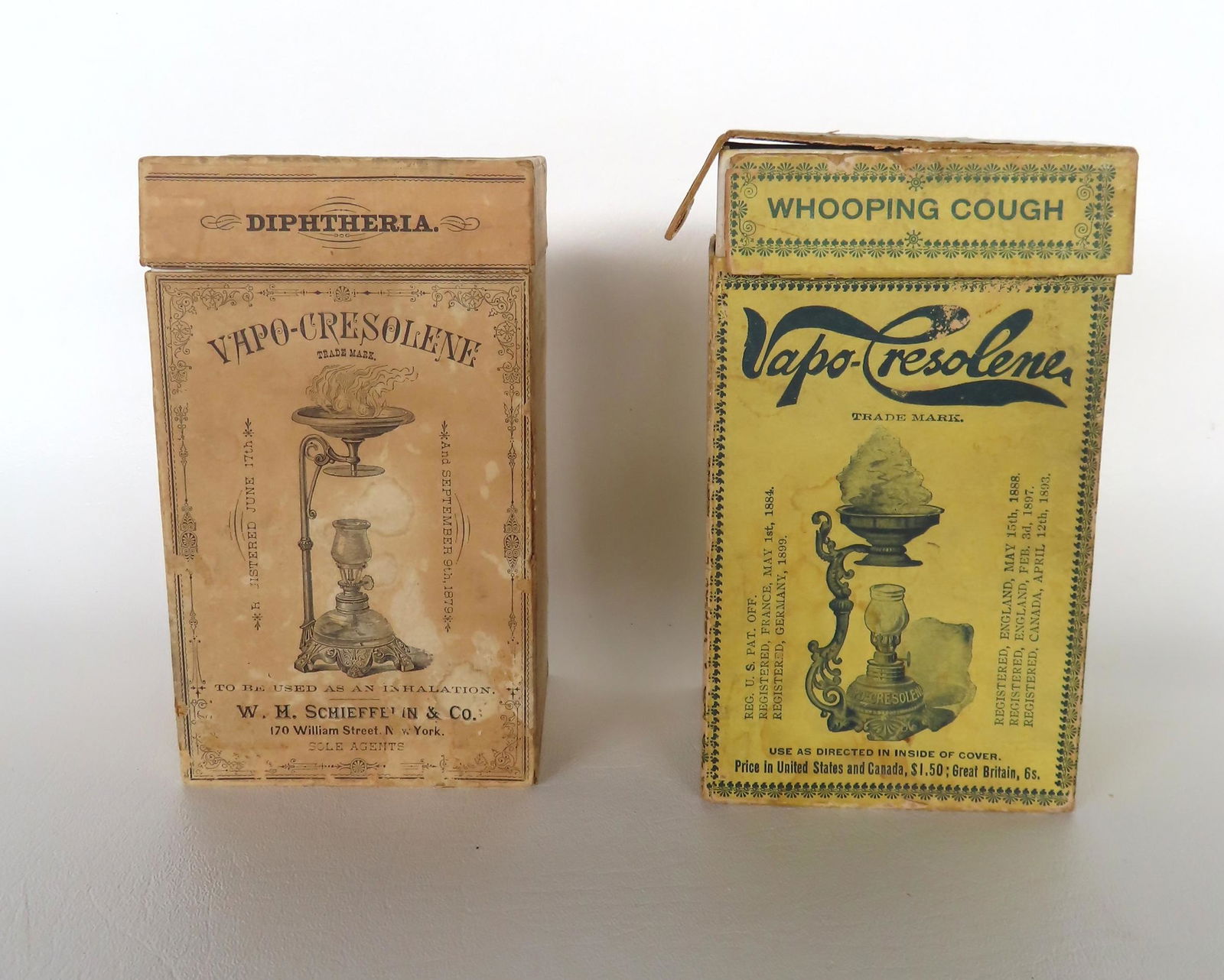 Two "Vapo-Cresolene" lamps in original boxes. The first by "W.H. Schieffelin & Co." NY, registered (1 of 5)