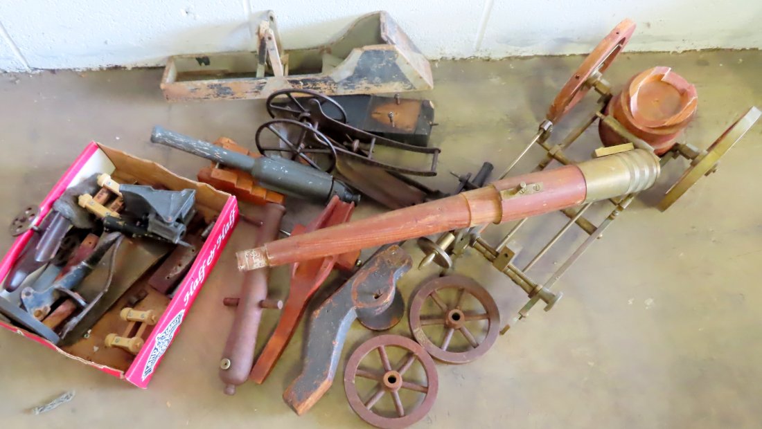 A grouping of cannon model parts and cannons for restoration. The largest 23"L x 8"H. None (1 of 8)