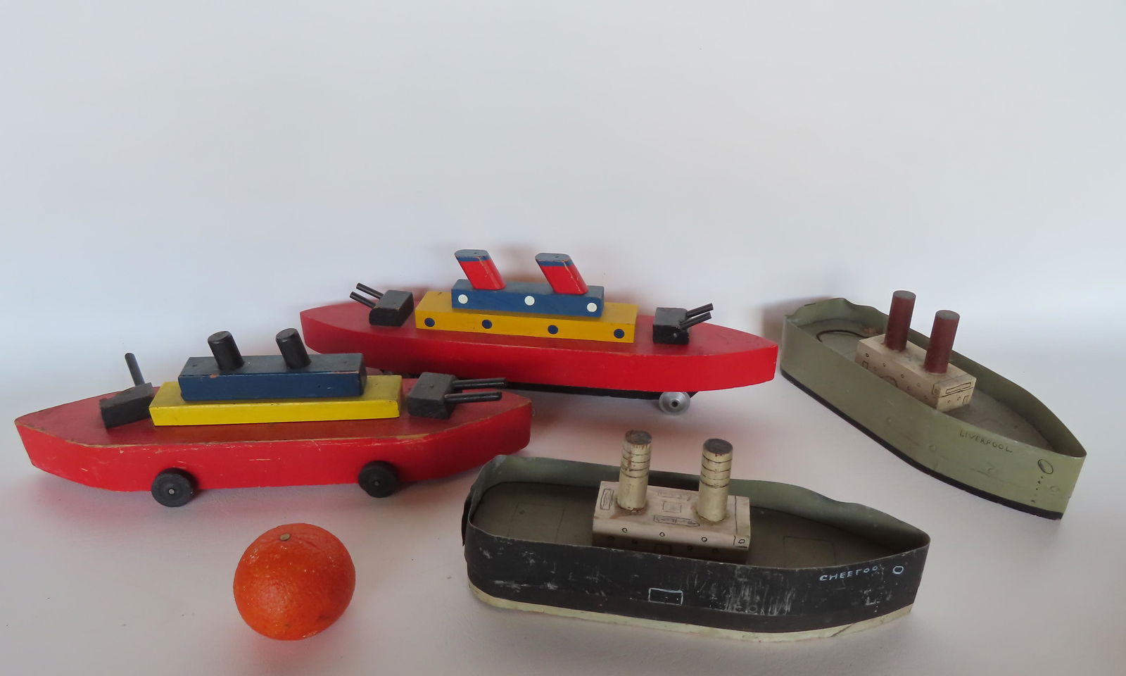 Grouping of 4 hand made vintage wooden boat models, the 2 with tin sides probably made by a child (1 of 8)